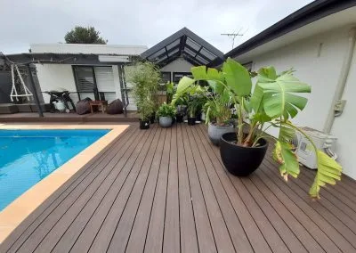 Steps and handrail on NewTechWood pool deck