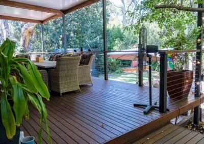 Finished merbau deck with insulated roof and garden screen